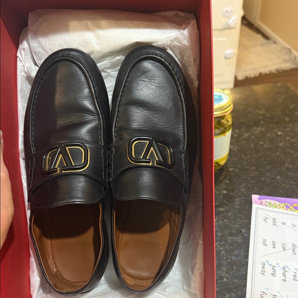Authentic Valentino Garavani Black Leather Loafers with Gold Accent